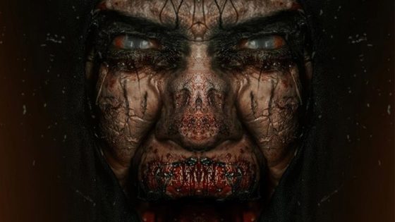 Close-up of a terrifying, cracked-skinned face with pale, blood-shot eyes and blood around the lips, framed by a dark hooded cloak.